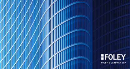 Curved modern glass building facade with vertical and horizontal lines, featuring the Foley & Lardner LLP logo in the lower right corner—an impressive corporate law office recognized for its lawyers in Chicago.