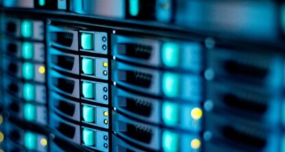 Close-up view of server racks with illuminated indicator lights in a data center, showcasing multiple hard drive bays and network equipment used for litigation support by Chicago lawyers.