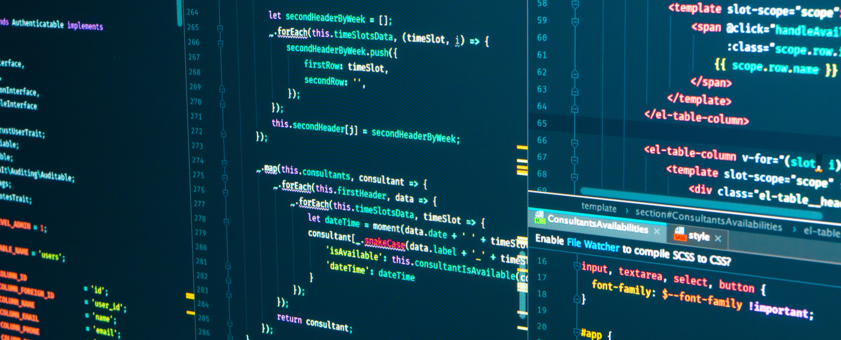 Close-up of multiple computer monitors displaying colorful programming code in various languages, including JavaScript and HTML, in a dark-themed editor—valuable assets for chicago lawyers specializing in intellectual property law.